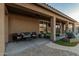 Spacious covered patio with stylish seating provides a relaxing outdoor entertaining area at 16077 W Anasazi St, Goodyear, AZ 85338