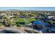 Community playground with play equipment, green spaces, and mountain views, promoting outdoor activity at 16077 W Anasazi St, Goodyear, AZ 85338