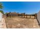 Large, fully fenced backyard with perimeter brick pavers and partial landscaping at 1676 W Sequoia Dr, Phoenix, AZ 85027