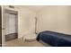 Neutral bedroom with a cozy bed and plenty of natural light and ample closet space at 1676 W Sequoia Dr, Phoenix, AZ 85027