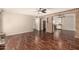 Open living room with brick archway and view of kitchen at 1676 W Sequoia Dr, Phoenix, AZ 85027