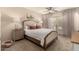 Serene bedroom featuring a king bed, soft lighting, and patio access for a relaxing retreat at 1676 W Sequoia Dr, Phoenix, AZ 85027