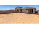 Large backyard awaiting your landscaping ideas to create a private oasis at 17032 W Cavedale Dr, Surprise, AZ 85387