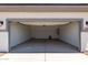 Spacious two-car garage ready for parking and storage at 17032 W Cavedale Dr, Surprise, AZ 85387