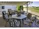 Inviting covered patio with outdoor seating and golf course views, perfect for relaxing at 17200 W Bell Rd # 1602, Surprise, AZ 85374