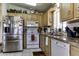 Efficient kitchen with granite countertops, stainless steel appliances, and ample cabinet space for cooking convenience at 17200 W Bell Rd # 1602, Surprise, AZ 85374