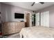 Cozy bedroom featuring a dresser and closet providing ample storage space at 1807 E Jamaica Ave, Mesa, AZ 85204