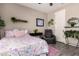 Cozy bedroom features bright, natural light, comfortable furnishings and stylish decor at 18334 W Marshall Ln, Surprise, AZ 85388