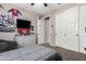 Teen bedroom featuring a bed, dresser, and decorations, providing a personalized space at 18334 W Marshall Ln, Surprise, AZ 85388