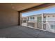 Enjoy views from this covered balcony with metal railings overlooking other homes in the community at 2121 W Sonoran Desert Dr # 14, Phoenix, AZ 85085