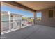 Covered balcony with metal railings provide space to relax and enjoy community views at 2121 W Sonoran Desert Dr # 14, Phoenix, AZ 85085