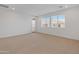 Large bedroom with carpet, recessed lighting, a door to a balcony, and window views at 2121 W Sonoran Desert Dr # 14, Phoenix, AZ 85085