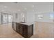 Modern kitchen boasts an island with sink, stainless steel appliances, and an open concept design at 2121 W Sonoran Desert Dr # 14, Phoenix, AZ 85085