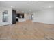 Expansive living area with tile flooring, recessed lights, and convenient access to the entryway at 2121 W Sonoran Desert Dr # 14, Phoenix, AZ 85085