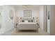Charming bedroom featuring a plush bed, stylish wallpaper, and elegant decor for a relaxing retreat at 24971 N 167Th Dr, Surprise, AZ 85387