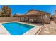 Private backyard featuring a refreshing pool, covered patio, and outdoor seating area at 2516 E San Manuel Rd, San Tan Valley, AZ 85143