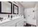 Standard bathroom featuring white cabinets and sink, with a shower and bath tub combination at 2516 E San Manuel Rd, San Tan Valley, AZ 85143