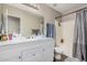 Bright bathroom with a white vanity, modern fixtures, and a shower-tub combination at 2516 E San Manuel Rd, San Tan Valley, AZ 85143
