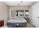Bright bedroom featuring large bay window, neutral colors, carpet, and ceiling fan at 2516 E San Manuel Rd, San Tan Valley, AZ 85143