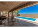 Covered patio and refreshing pool area, perfect for outdoor relaxation and entertaining at 2516 E San Manuel Rd, San Tan Valley, AZ 85143
