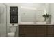 Bathroom with modern vanity, bronze hardware and framed art at 25233 N 177Th Dr, Surprise, AZ 85387
