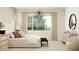 Comfortable bedroom featuring a plush bed, soft lighting, and stylish decor at 25233 N 177Th Dr, Surprise, AZ 85387