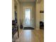 Home entryway featuring a beautiful glass door and neutral paint at 25979 W Taro Dr, Buckeye, AZ 85396