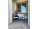 Charming front porch with seating and lovely desert decor at 25979 W Taro Dr, Buckeye, AZ 85396