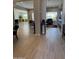 Open concept living area with tile flooring and natural light at 25979 W Taro Dr, Buckeye, AZ 85396
