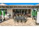 Spacious covered patio featuring ample dining and seating arrangements, perfect for outdoor entertaining at 25979 W Taro Dr, Buckeye, AZ 85396