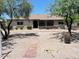 Charming single-story home with desert landscaping and a brick walkway leading to the front door at 2602 S 226Th Dr, Buckeye, AZ 85326