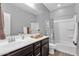 Bathroom showcasing a single sink vanity with lots of storage and a shower-tub combo at 2670 E Bellerive Dr, Gilbert, AZ 85298