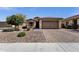 Charming single-Gathering home features low-maintenance desert landscaping and a spacious two-car garage at 2670 E Bellerive Dr, Gilbert, AZ 85298