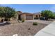 Charming single-Gathering home features low-maintenance desert landscaping and a spacious two-car garage at 2670 E Bellerive Dr, Gilbert, AZ 85298