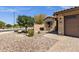 Attractive single-story home with desert landscaping, brick driveway and a ring doorbell at 2670 E Bellerive Dr, Gilbert, AZ 85298