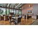 Relaxing lounge features multiple seating areas, a fireplace, and media center with a large picture window at 2670 E Bellerive Dr, Gilbert, AZ 85298