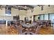 Modern lounge area with neutral tones, stainless steel accents, kitchen area and comfortable seating at 2670 E Bellerive Dr, Gilbert, AZ 85298