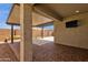 Covered outdoor patio with brick flooring and an outdoor television at 2670 E Bellerive Dr, Gilbert, AZ 85298