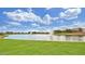 Scenic pond with fountains and grassy areas offers a relaxing atmosphere for residents to enjoy at 2670 E Bellerive Dr, Gilbert, AZ 85298