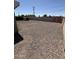 Spacious backyard area featuring low maintenance landscaping, mature trees and privacy fencing at 2831 W Montecito Ave, Phoenix, AZ 85017