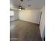 The bedroom has a ceiling fan, and tile flooring at 2831 W Montecito Ave, Phoenix, AZ 85017