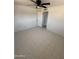 Bedroom with tile flooring, neutral walls, and a ceiling fan at 2831 W Montecito Ave, Phoenix, AZ 85017