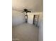 Spacious bedroom features tile flooring, closet and ceiling fan at 2831 W Montecito Ave, Phoenix, AZ 85017
