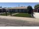 Charming home featuring a low fence with artificial turf and a lovely walkway at 2831 W Montecito Ave, Phoenix, AZ 85017