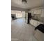 Bright kitchen features modern stainless steel appliances and white cabinetry at 2831 W Montecito Ave, Phoenix, AZ 85017