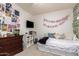 This bedroom features a comfortable daybed, playful decor, and ample space for storage and relaxation at 3059 E Parkview Dr, Gilbert, AZ 85295