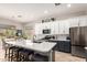 Modern kitchen with a large island, stainless steel appliances, and stylish cabinetry at 3059 E Parkview Dr, Gilbert, AZ 85295