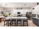 Elegant kitchen with stainless steel appliances, granite countertops, and modern finishes at 3059 E Parkview Dr, Gilbert, AZ 85295