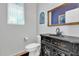 Bathroom with decorative vanity, mirror and toilet at 31269 N Cavalier Dr, San Tan Valley, AZ 85143