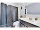 Bathroom with shower featuring neutral-toned walls and vanity at 31269 N Cavalier Dr, San Tan Valley, AZ 85143